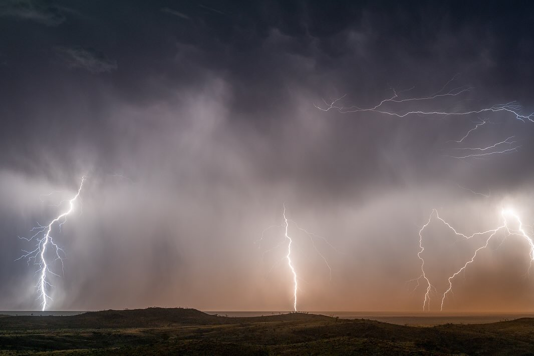 A wide shot of lightening and a storm 