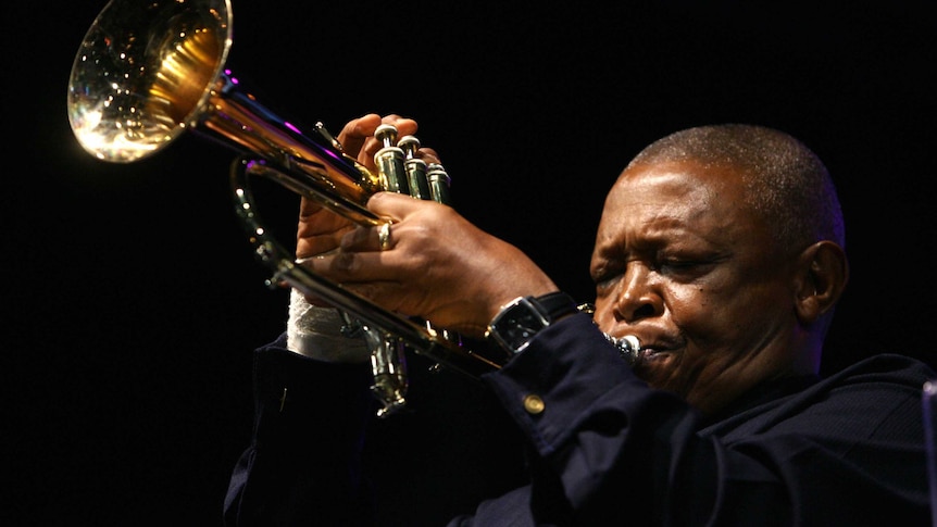 South African jazz great Hugh Masekela performs at the funeral of music legend and anti-apartheid activist Miriam Makeba in 2008.