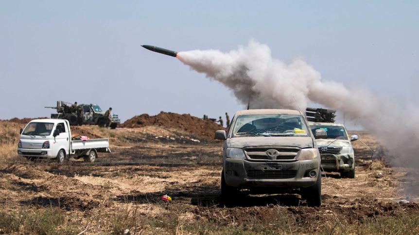 Kurdish fighters fire shells towards Tel Abyad