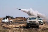Kurdish fighters fire shells towards Tel Abyad