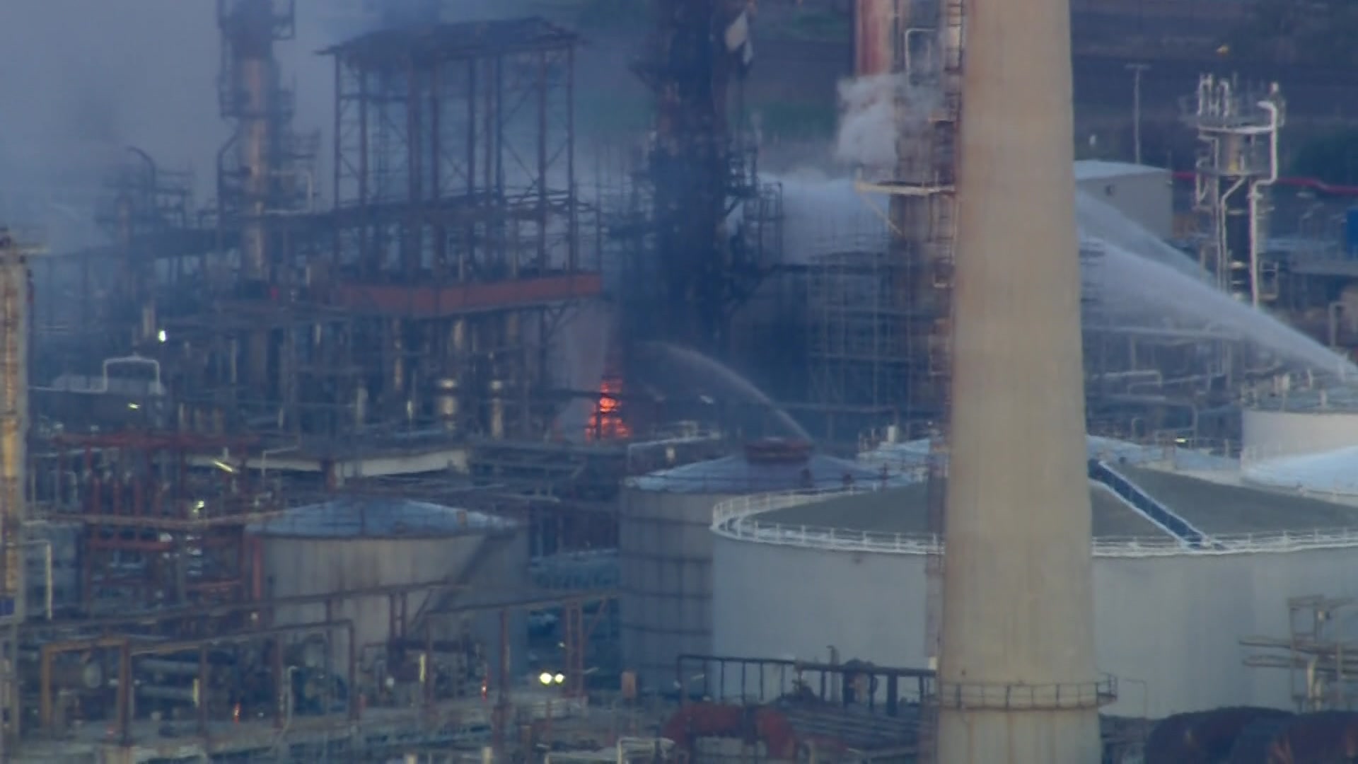 Firefighters are battling a huge fire at an oil refinery in Geelong.
