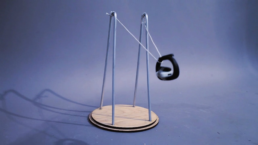 A fitness tracker strapped to a pendulum.