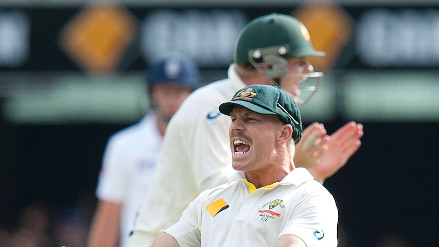 David Warner reacts to the dismissal of England's Matt Prior on day four at the Gabba.