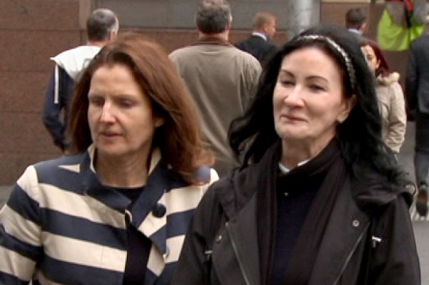 Rebecca Taylor, right, leaves an IBAC hearing in Melbourne with an unidentified woman.