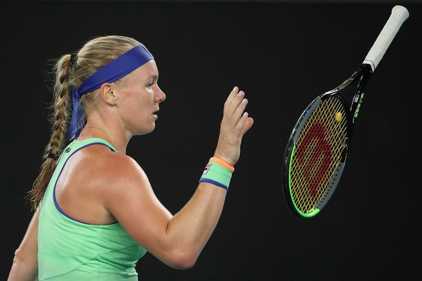 Dutch tennis player Kiki Bertens throws her Wilson brand tennis racket.
