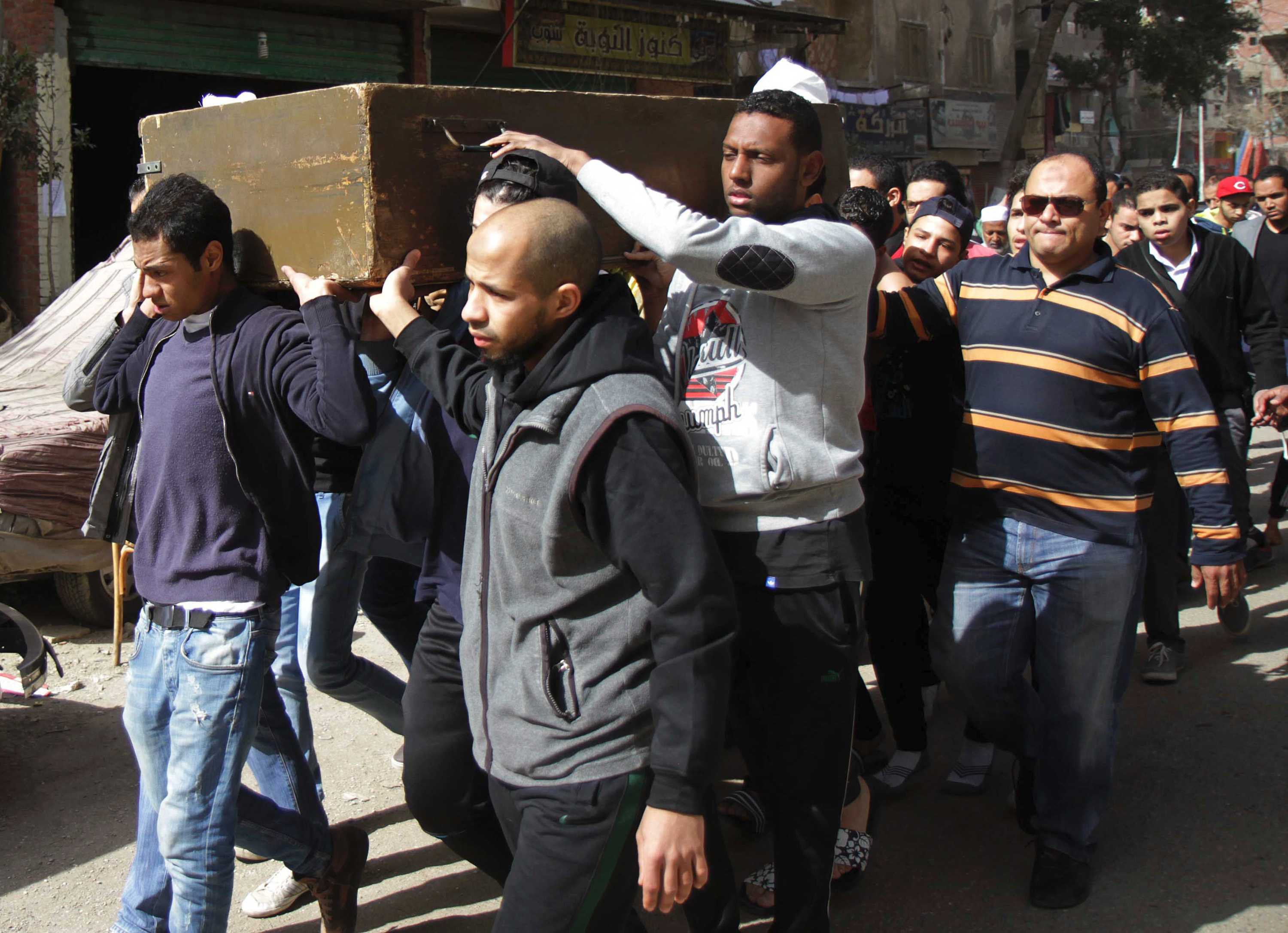 Egypt football riot: Families of dead fans to be compensated, probe ...