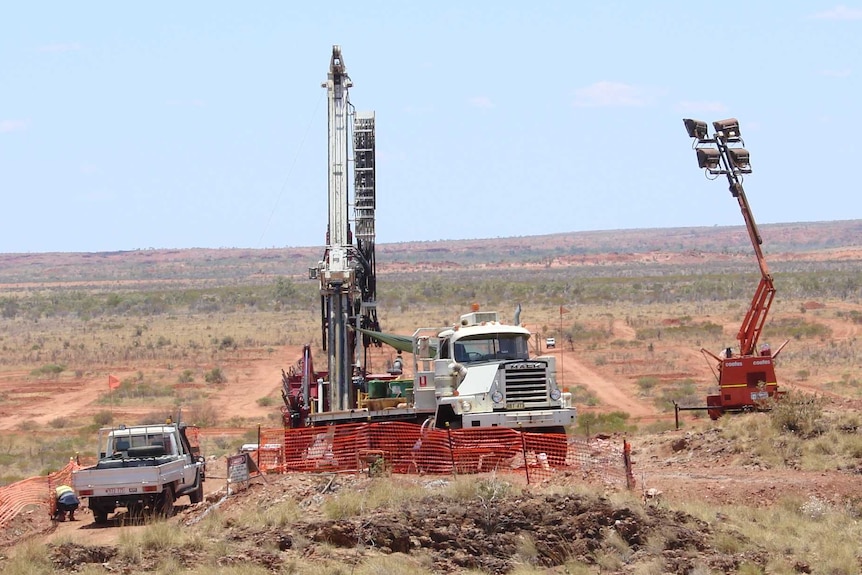 Drill Rig and ute at Kintyre uranium project.WA Pilbara