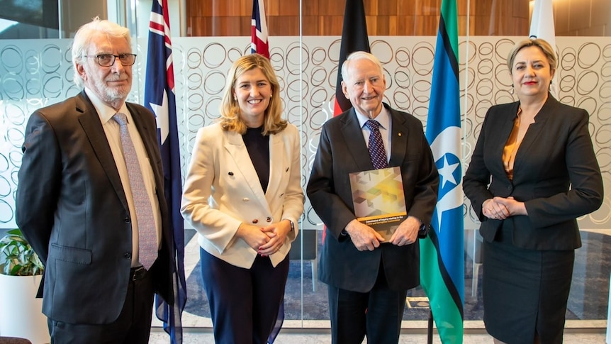 Alan Wilson, Shannon Fentiman, Tony Fitzgerald and Annastacia Palaszczuk with report into Crime and Corruption Commission