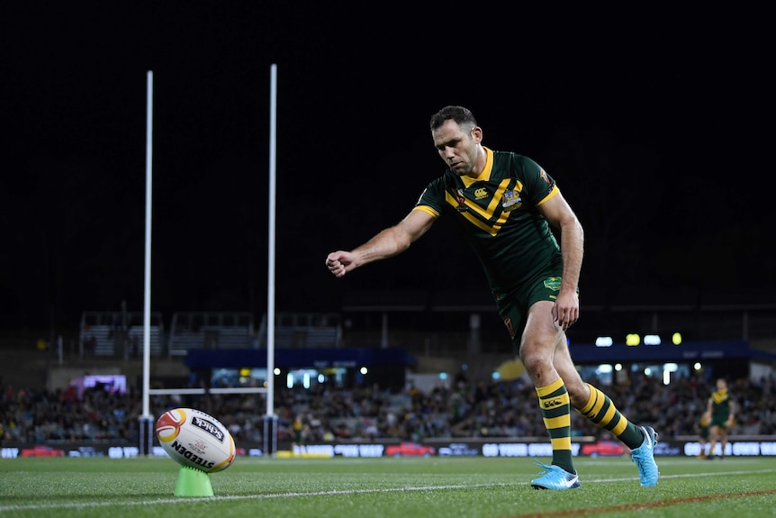 Cameron Smith of the Kangaroos kicks during the 2017 Rugby League World Cup match against France.