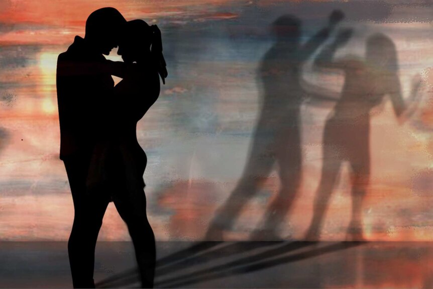Silhouette of couple hugging with shadow of them fighting.