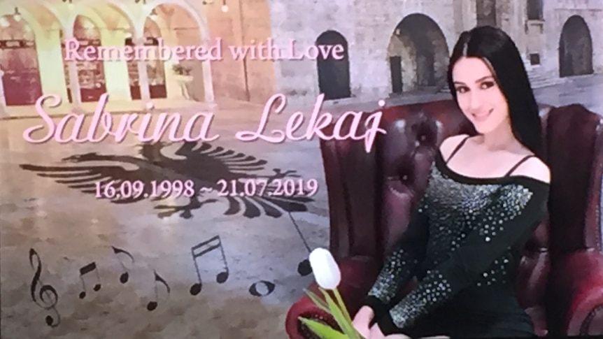 A display with a picture of Sabrina Lekaj