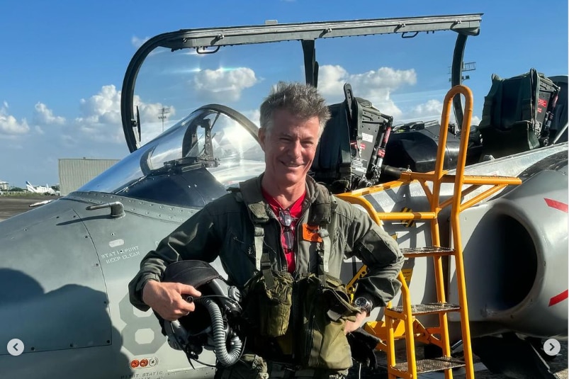 A man piloting a fighter jet