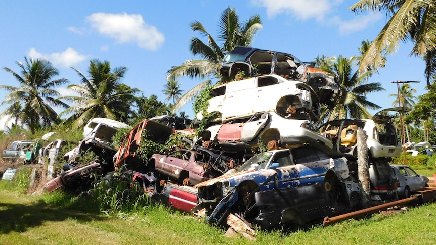 Abandoned cars on the main island of Tongatapu in the Kingdom of Tonga