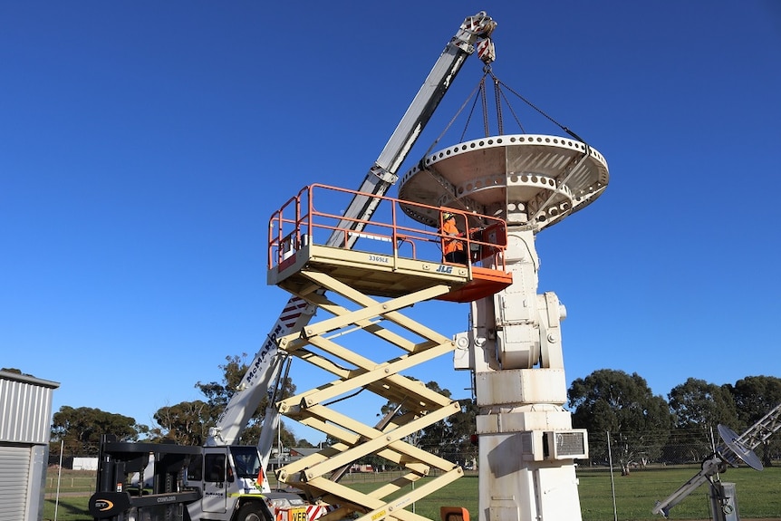 The satellite tracker being dismantled at the South Australian defence base.