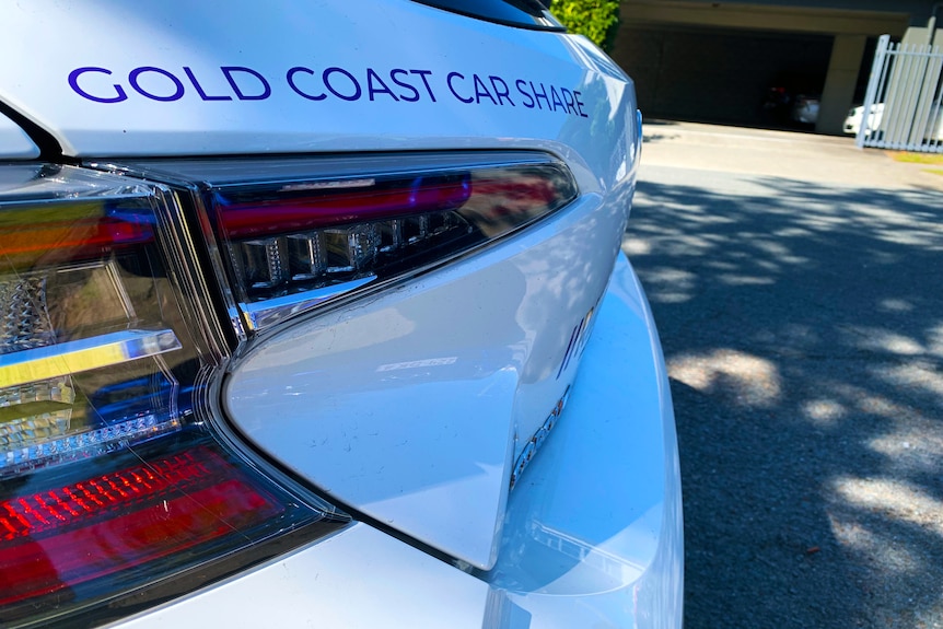 boot of car with writing gold coast car share