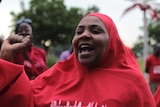 A #BringBackOurGirls campaigner shouts during a rally in Abuja, Nigeria