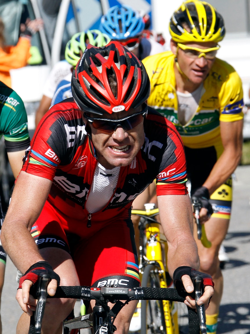 Cadel Evans climbs followed by Thomas Voeckler during the 18th stage of the 2011 Tour de France.