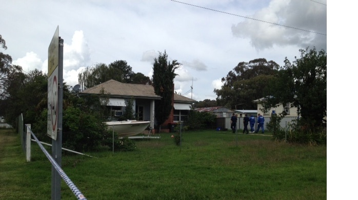 Police at the scene of an investigation into the death of an 11-month-old baby in the NSW Central West