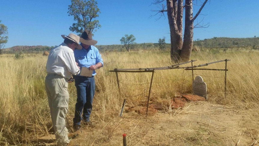 Alex Aitken and Trevor Tough at a bush grave in the Kimberley