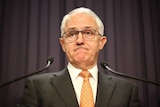 Malcolm Turnbull stands at podium