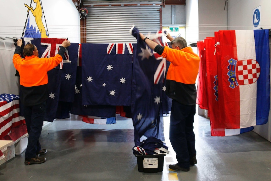 Flags are washed, hung, dried and folded after use.