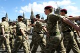 Soldiers from 16 Air Assault Brigade march toward the Houses of Parliament.