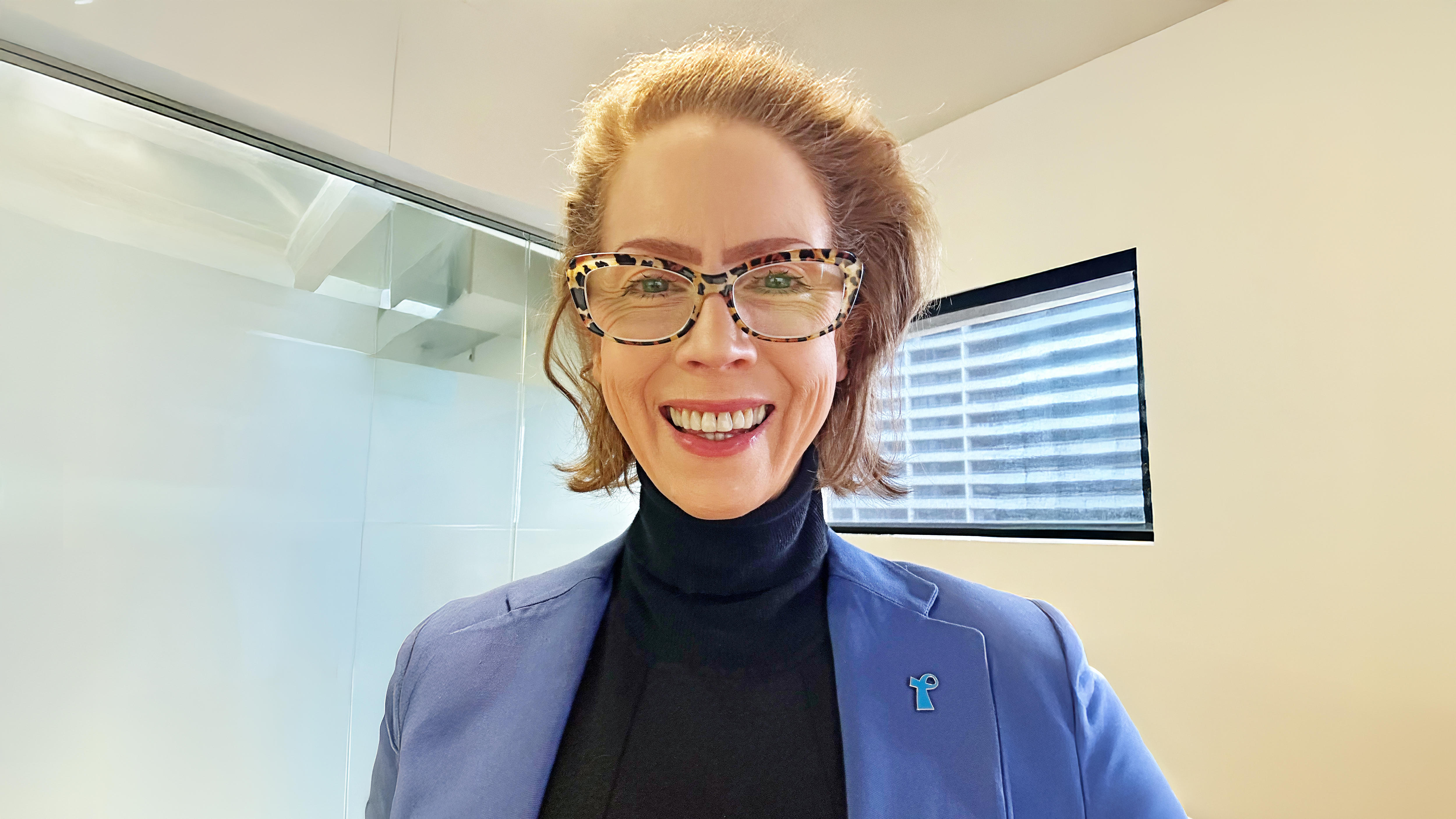 Portrait of a woman in a blue blazer