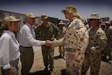 Meet and greet: Malcolm Turnbull and Julie Bishop with troops in Afghanistan.