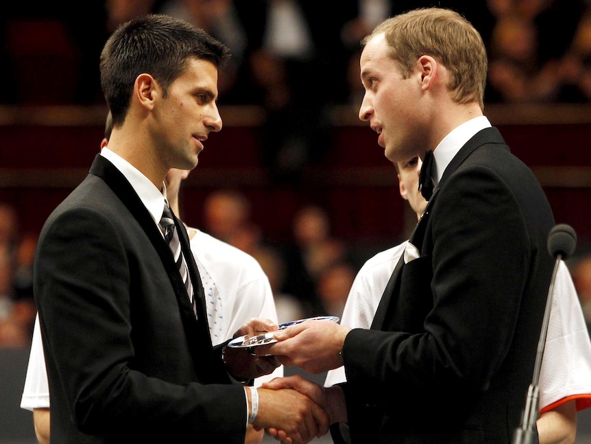 Prince William, Duke of Cambridge, and Novak Djokovic at charity event in London.