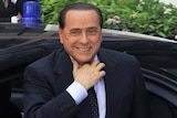 Italy's Prime Minister Silvio Berlusconi arrives for a two-day EU leaders summit in Brussel