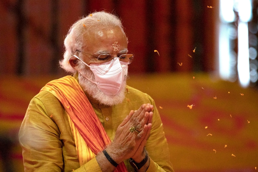 Indian Prime Minister Narendra Modi performs rituals during the ceremony of a temple dedicated to the Hindu god Ram.