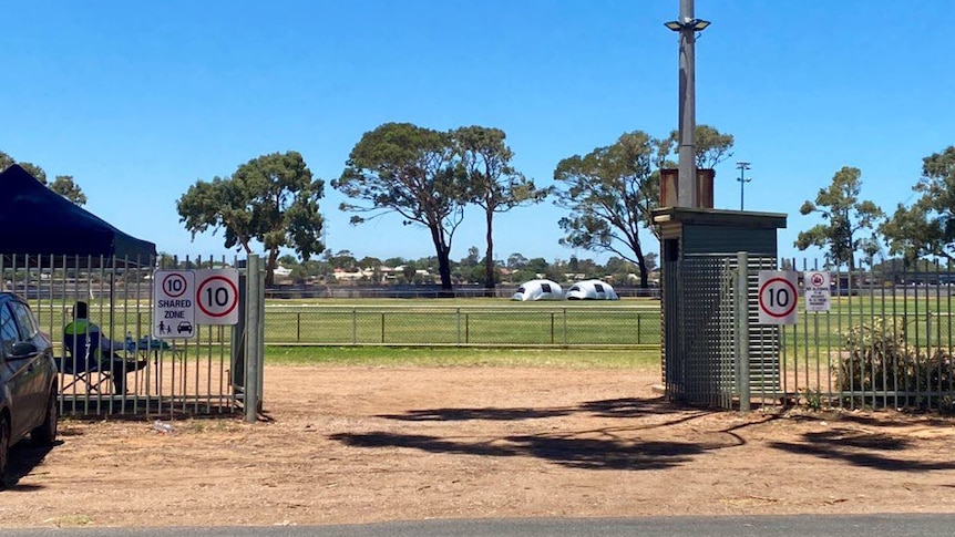 A country oval on a clear sunny day.