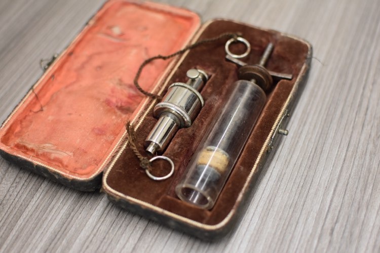 An artificial leech canister sits on display on a table in Brisbane.