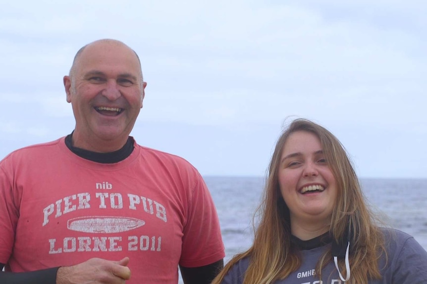 Bruce and Chelsea Matheson smile for a portrait