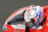 Casey Stoner cruises around Phillip Island on his way to pole