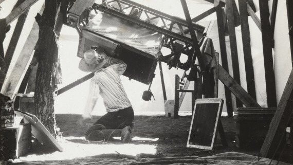 Dr Trumpler observing the sun through the Lick Observatory's 5-foot camera at Wallal.