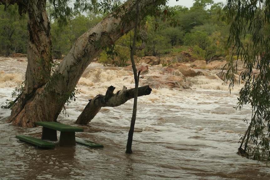 Cyclone dumps water in swimming hole