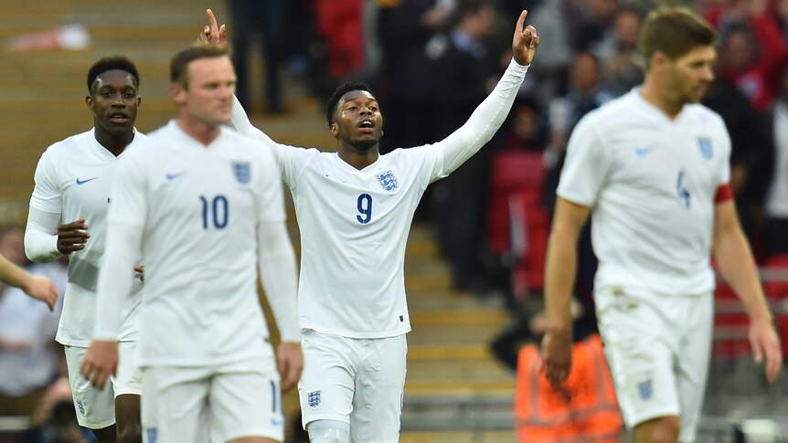 Daniel Sturridge celebrates scoring for England