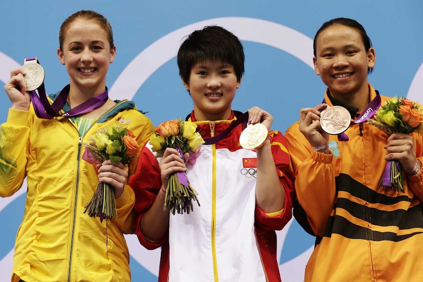 Medallists pose after 10m platform diving final