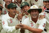 Adam Gilchrist, Ricky Ponting and Shane Warne celebrate with a replica Ashes urn after series win
