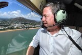 Queensland LNP leader Tim Nicholls looks on during a helicopter flight over Townsville.