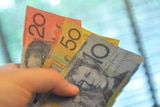 Australian bank notes held in a hand