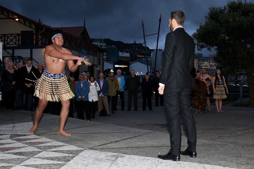 Wellington Phoenix player Andrew Durante takes part in a traditional Maori ceremony
