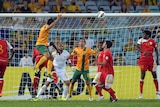 Tim Cahill finds the net against Oman