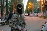 Pro-Russia separatist stands guard in Slaviansk