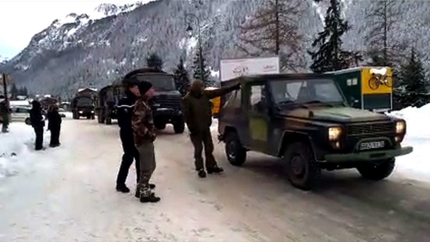 French troops near the site of the avalanche.