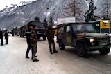French troops near the site of the avalanche.