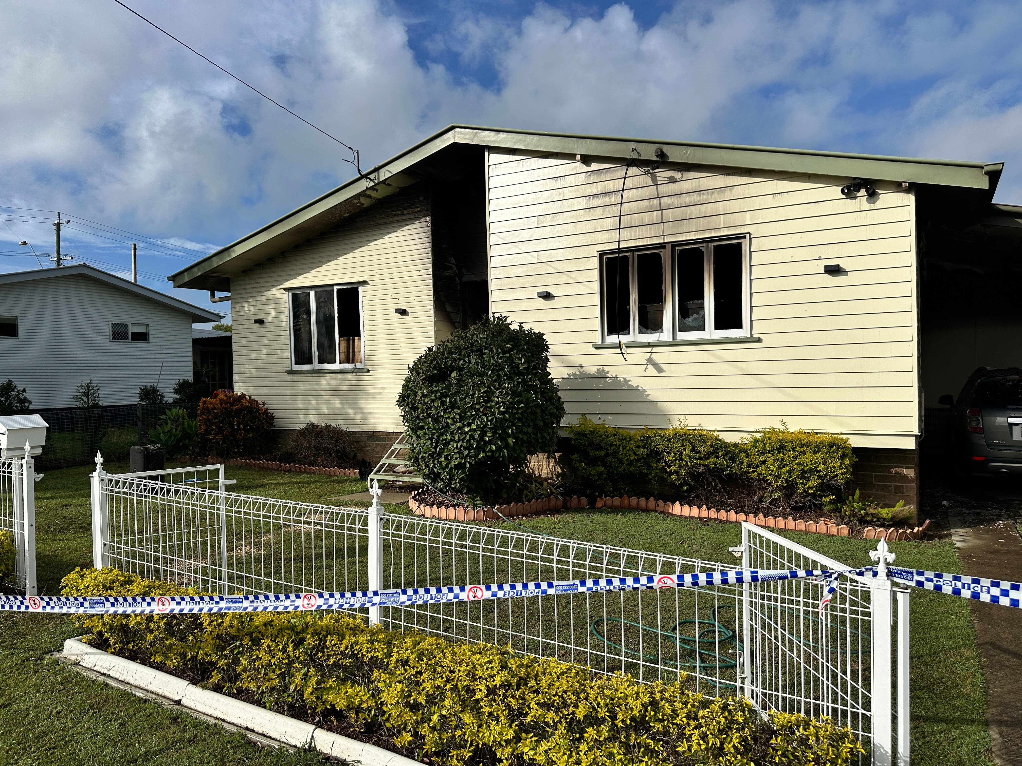 A house with smoke damage. 