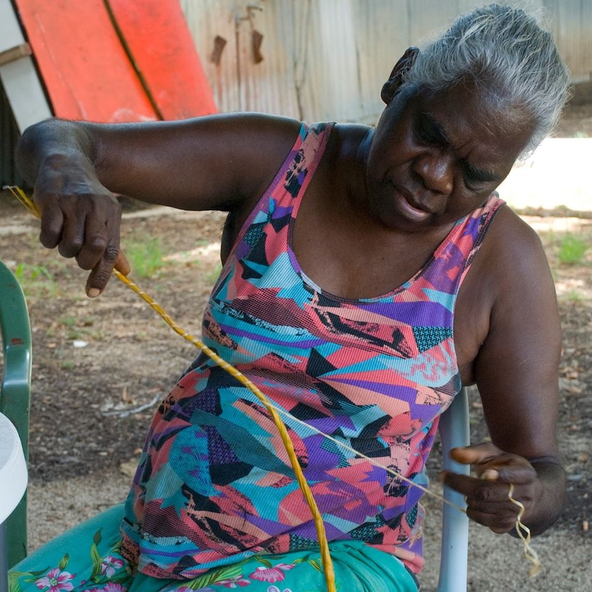 Margaret Duncan making pandanus rope for weaving