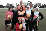 GWS Giants player Sam Frost with the newly named Auburn Giants women's AFL team April 4, 2014.